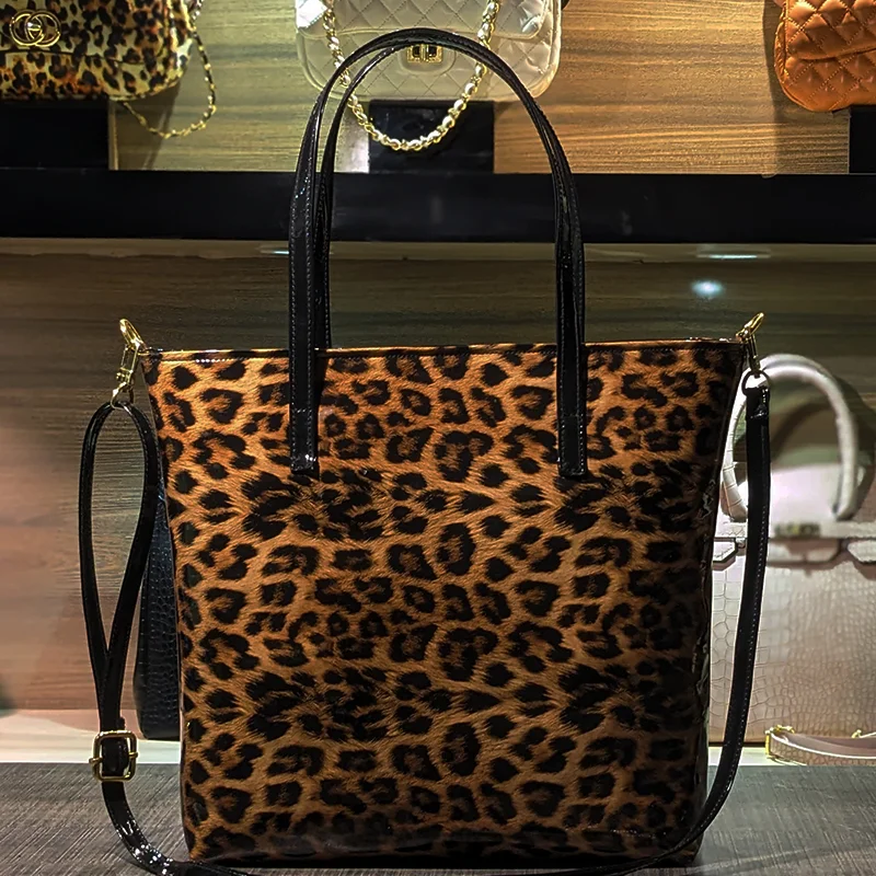 leopard print tote bag for ladies with patent black handles and shoulder strap