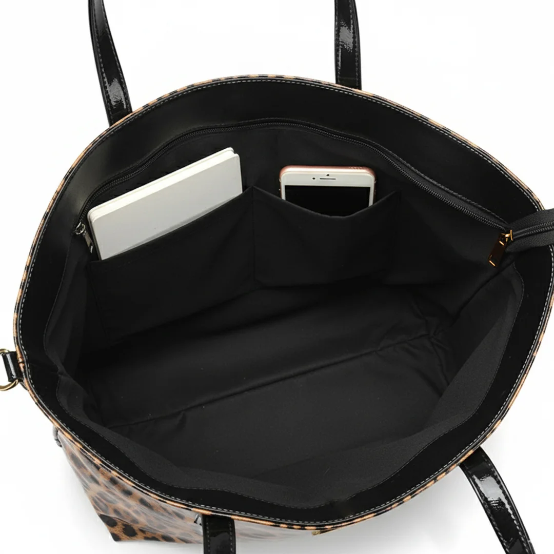 leopard print tote bag for ladies with patent black handles and shoulder strap inner view