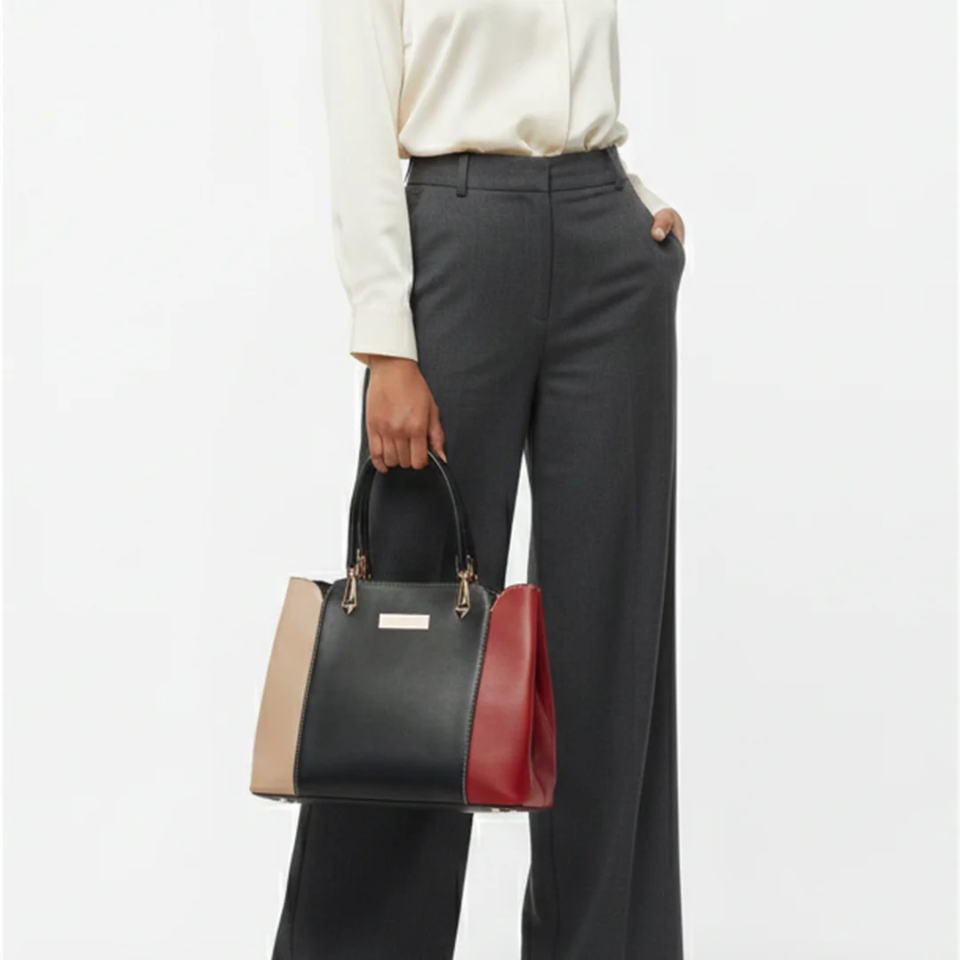Model carrying Multi color Shoulder Bag by vibe totes