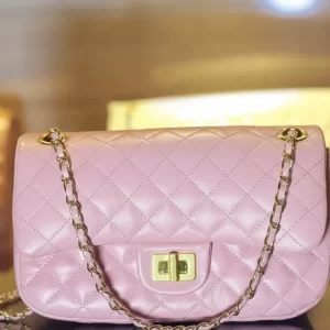 Front view of pink quilted leather ladies crossbody bag by Vibe Totes