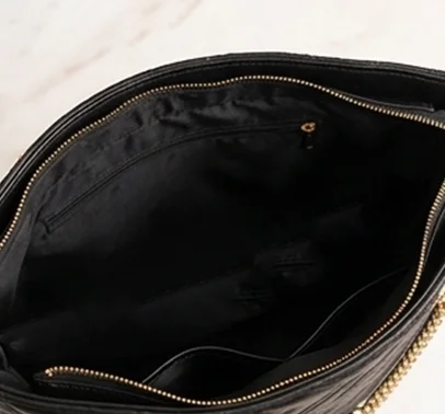 inner view of black quilted tote bag with lining syle for women with gold chain handles by VibeTotes Pakistan