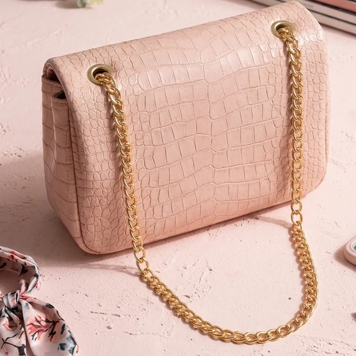 pink crocodile leather crossbody bag back view. | buy online at vibetotes