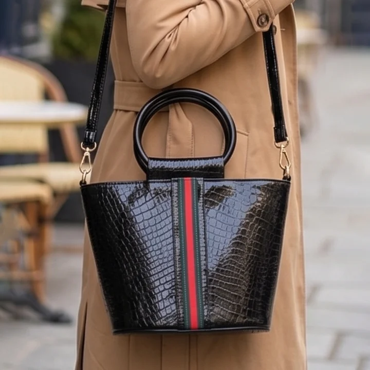 Model carrying the Vibe Totes black crocodile textured crossbody bag, a stylish and structured choice among everyday ladies bags.